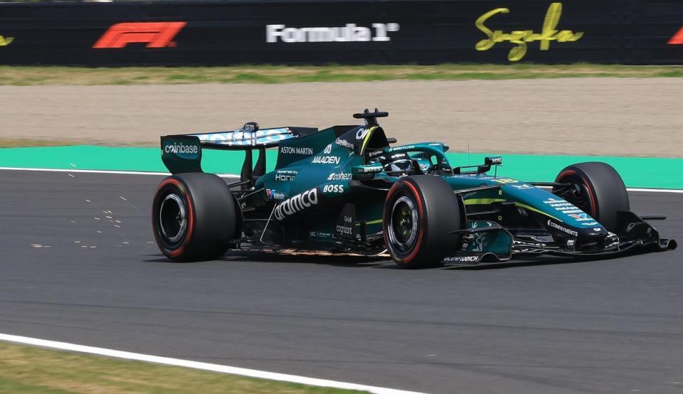 １コーナーを駆け抜けるアストンマーティン・ホンダのランス・ストロール＝鈴鹿サーキット（撮影・神子素慎一）