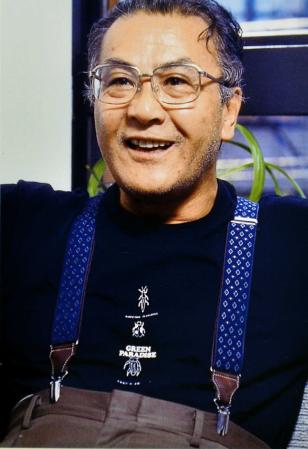　石井光三さんの遺影（事務所提供）