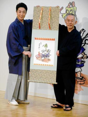 宮崎駿監督が描いた七代目尾上丑之助初舞台の「祝幕」の原画を披露する尾上菊之助（左）と鈴木敏夫氏＝東京・コートヤード・マリオット銀座東武ホテル