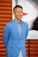 術後の経過を報告した宮本亜門氏＝東京文化会館