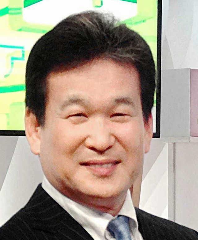 　辛坊治郎氏