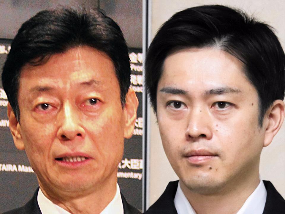西村康稔経済再生担当大臣（左）と吉村洋文大阪府知事