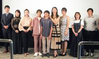 「ある家族」の舞台あいさつを行った野村真美（右から４人目）、寺田もか（左から３人目）ら＝大阪市内