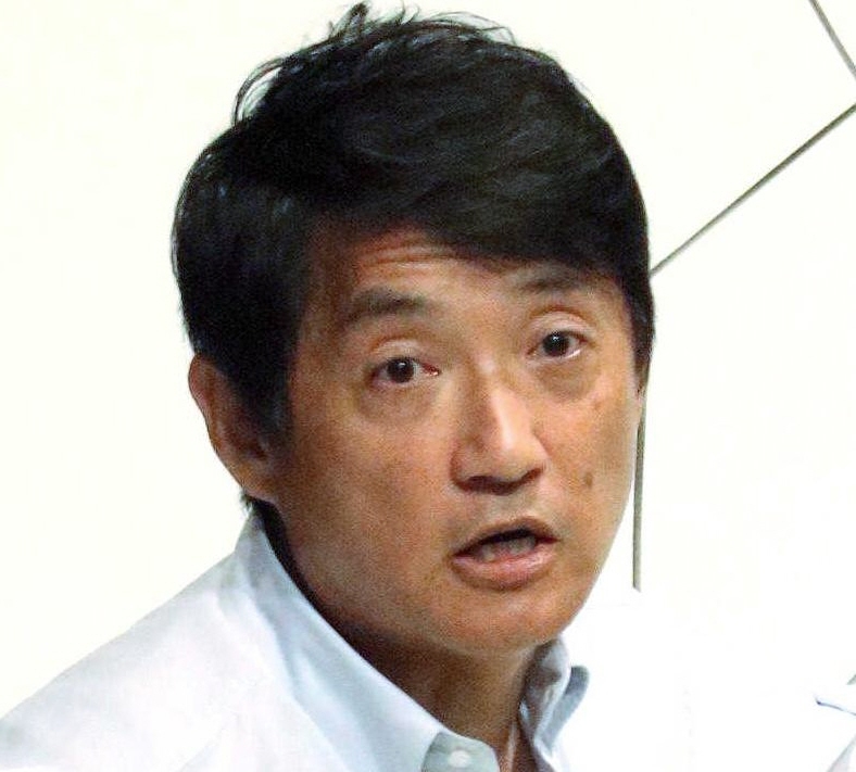 　高岡達之氏