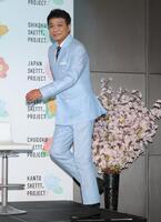 　アンバサダーとして登壇する中山秀征（撮影・西岡正）