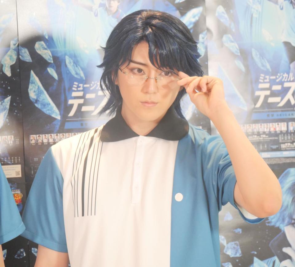 　撮影に応じた草地稜之