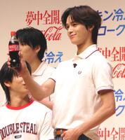 　撮影に応じるＫ