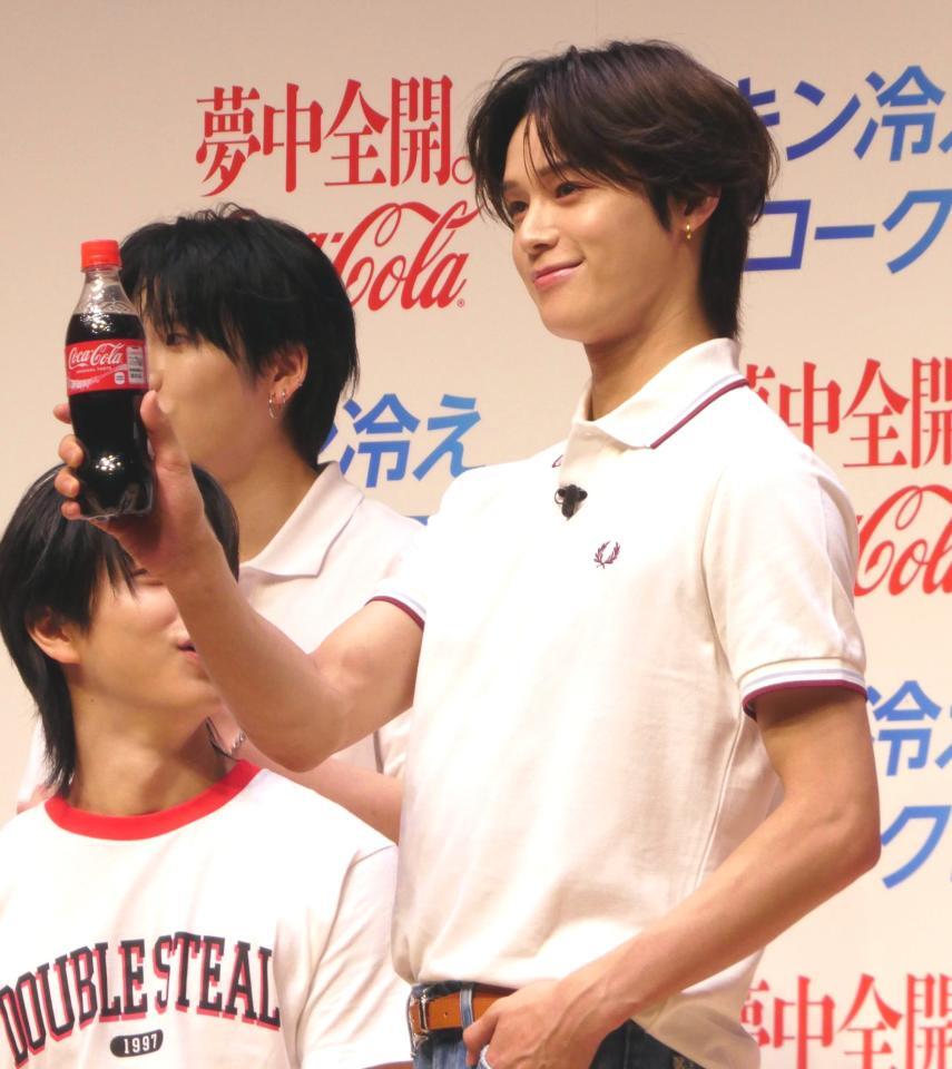 　撮影に応じるＫ