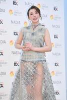 　シースルー衣装でほほ笑む仲里依紗（撮影・開出牧）