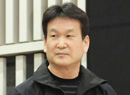 　辛坊治郎氏