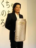 色気がすごい…。ＣＭ会見に登場した豊川悦司ら＝２０１３年撮影