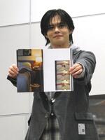 　写真撮影に応じるカイ