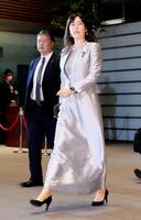 　皇居での認証式を前に首相官邸に入る小野田紀美経済安保相＝２１日