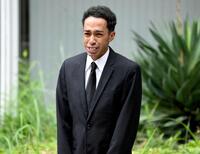 　釈放された草間リチャード敬太＝１０月６日