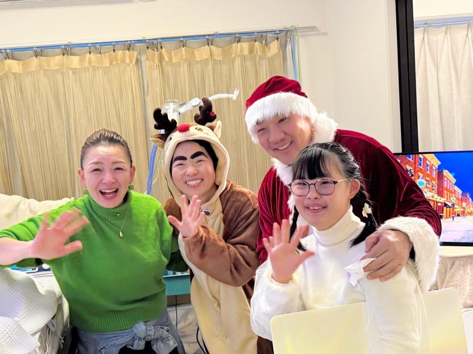 　西村氏とイモトアヤコの訪問を受けた田中ファミリー