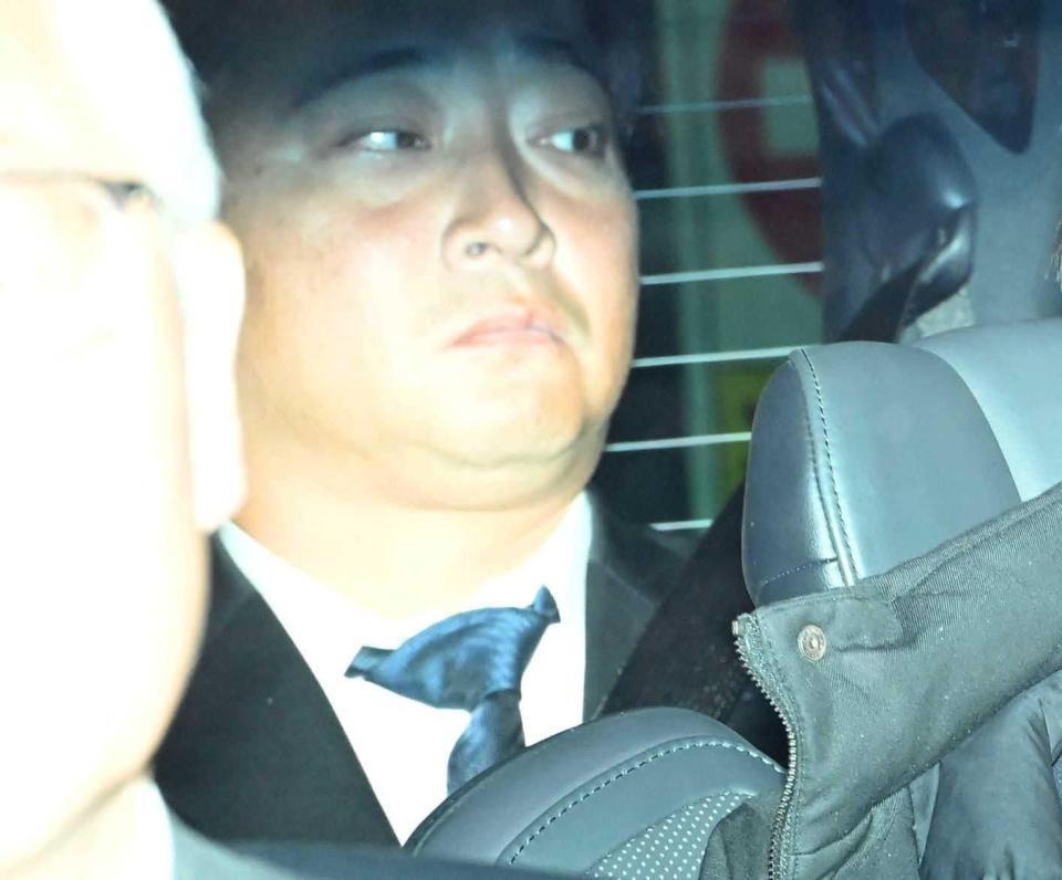 　東京地裁を出る斉藤慎二被告