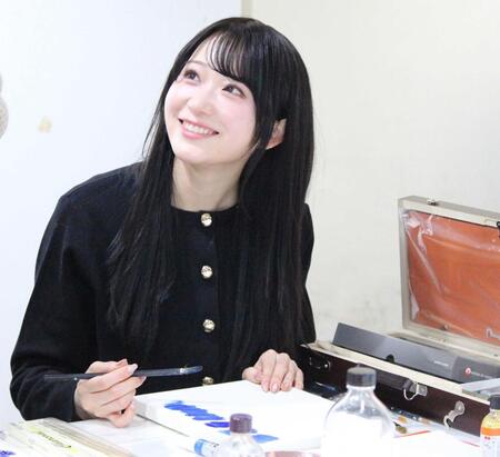 レクチャーを笑顔で受ける橋本真希