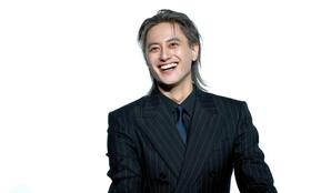 笑顔を見せる小島健（撮影・金田祐二）