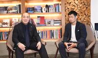 「子供の未来」をテーマに対談した西村誠司社長（左）と長谷川穂積氏