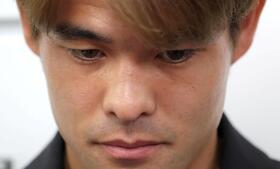 帰国し、Ｗ杯への思いを語った佐野海舟＝羽田空港（撮影・吉澤敬太）