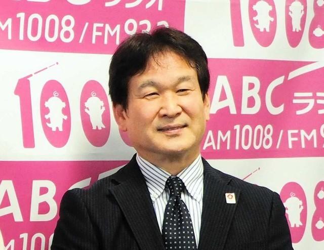 辛坊治郎氏