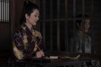 遊女屋の女将・吉祥（鶴田真由）