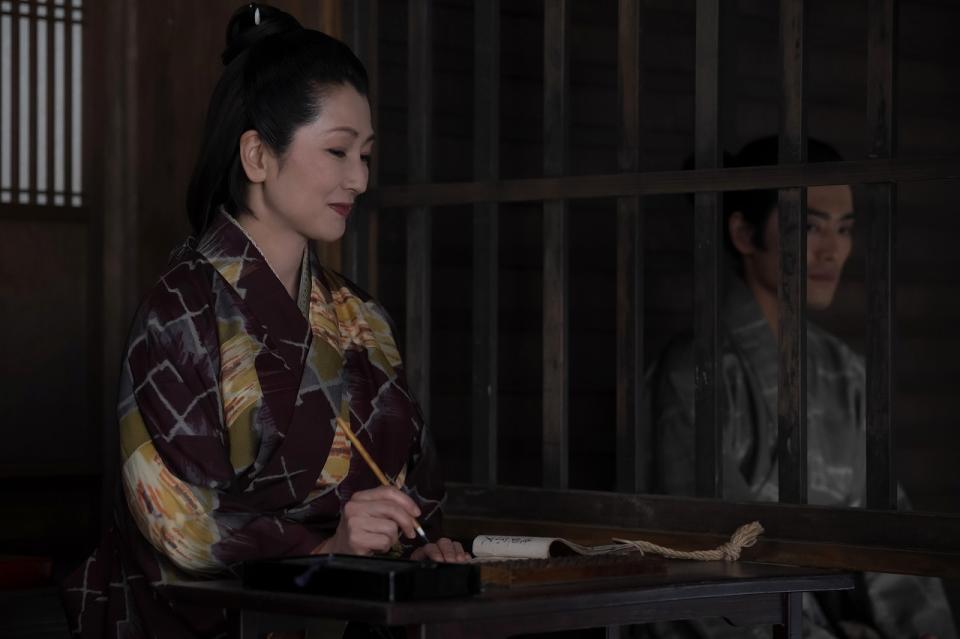 遊女屋の女将・吉祥（鶴田真由）