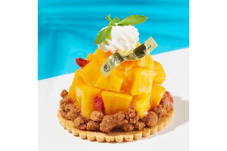 　まろやかな甘さのマンゴーをたっぷり使った「ごろごろマンゴータルト」（１個・１０８０円）