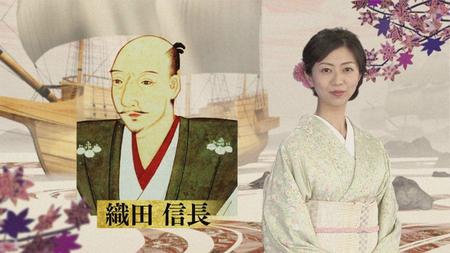 　渡邊佐和子アナウンサーと織田信長の肖像画。ヒストリアで２０回以上も取り上げられた　所蔵 長興寺　（Ｃ)ＮＨＫ