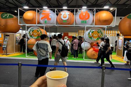 　『大阪・関西万博』のＷＡＳＳＥに８月２７日～３１日、愛媛県ブースが登場。商品を買うと利用できる「みかんジュース蛇口」が設置されている（８月２７日／Ｌｍａｇａ.ｊｐ撮影）