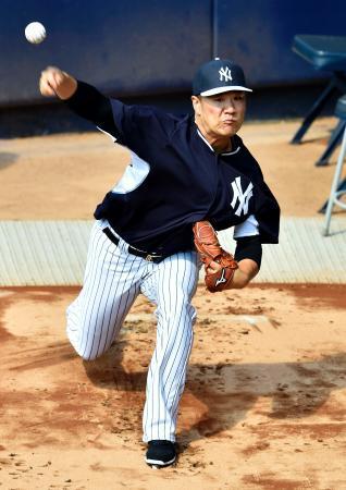 田中は３２球の投球練習