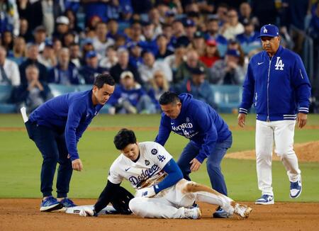 ドジャースに激震　大谷翔平が二塁滑り込みで左肩負傷　好投・由伸で連勝も　ＮＹチャーター機には乗らず