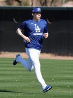 　ダッシュする佐々木