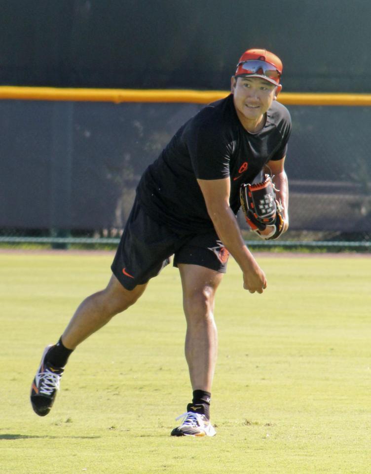 　調整する菅野（共同）