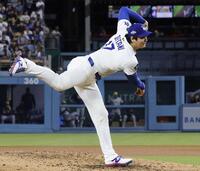 　先発し、７回途中無失点で勝利投手になった大谷（共同）