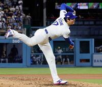 　先発し、７回途中無失点で勝利投手になった大谷（共同）