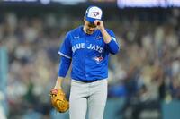 　フリーマンにサヨナラ弾を浴び肩を落とすリトル（写真：AP/アフロ）