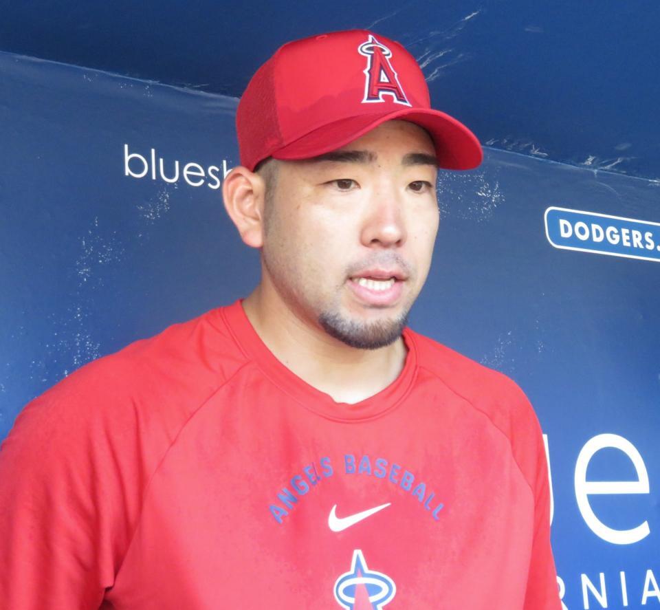 報道陣の質問に答える菊池(撮影・小林信行)