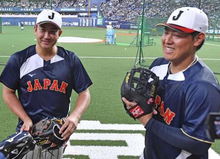 菅野智之（左）と岡本和真
