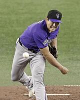 先発した菅野（共同）