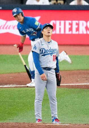 　５回、岡本（奥）を左飛に打ち取る山本（共同）