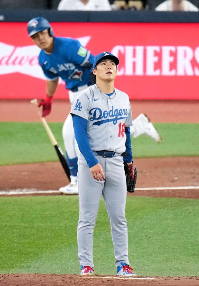 　５回、岡本（奥）を左飛に打ち取る山本（共同）