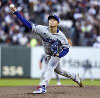 先発した山本（共同）