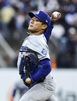 先発した山本（共同）