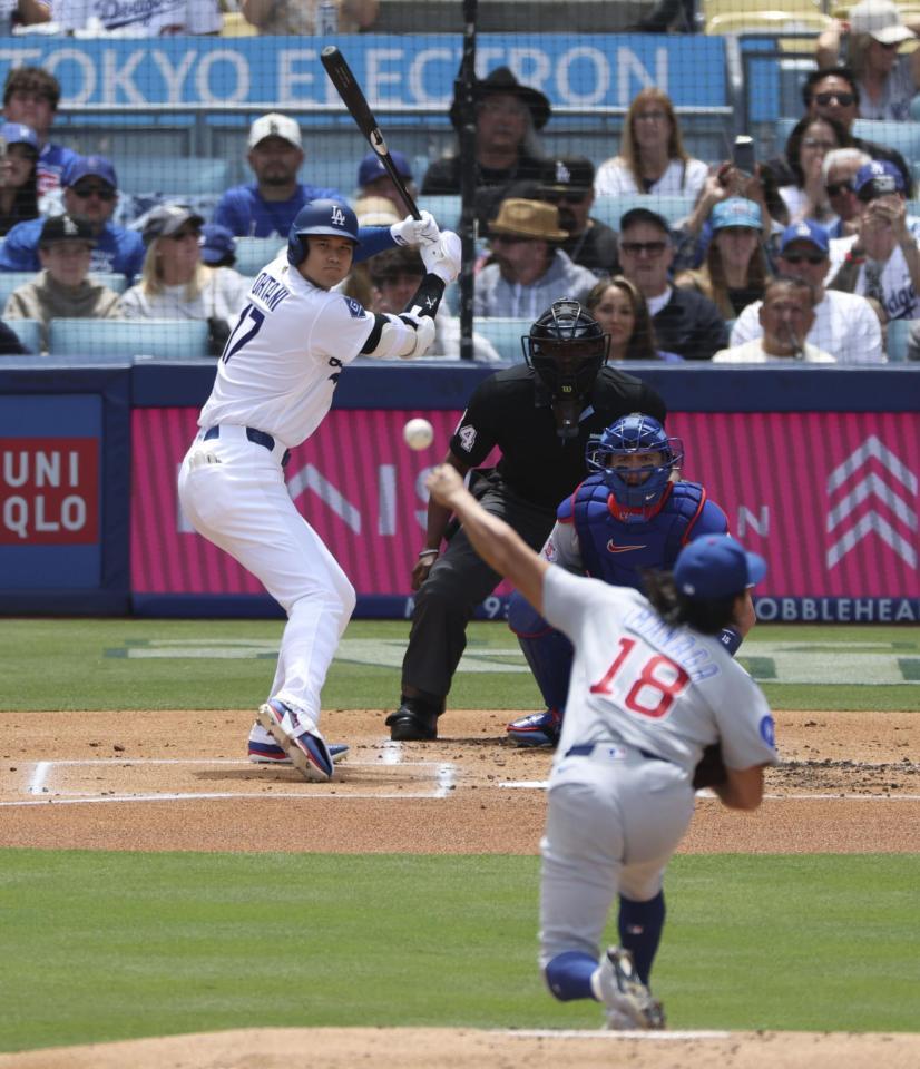 １回、対戦する今永（１８）と大谷（共同）