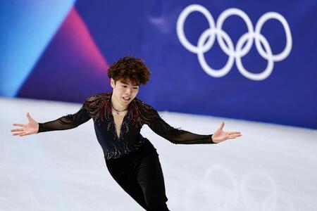 団体男子フリー　演技する佐藤駿（共同）