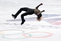 団体男子フリー　後方宙返りを決めるイリア・マリニン（共同）