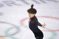 　男子フリー　演技する佐藤駿＝ミラノ（共同）