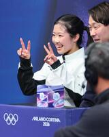 女子ＳＰで演技を終え、笑顔を見せる中井亜美