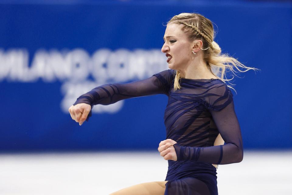 女子フリーの演技を終え、ガッツポーズするアンバー・グレン＝ミラノ（共同）